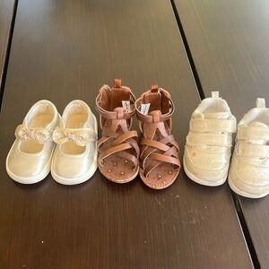 Three pair of Carter's size 4 girls toddler shoes